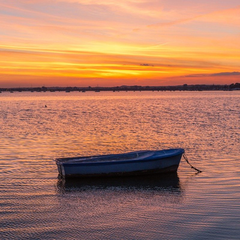 Lonely Boat at Sunset